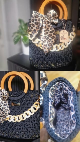Navy knitted handbag with leopard print bow, gold handles, chain detail