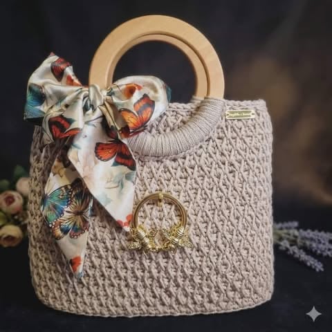 Beige crocheted handbag with wooden handles, colorful butterfly scarf bow, and gold ring charm